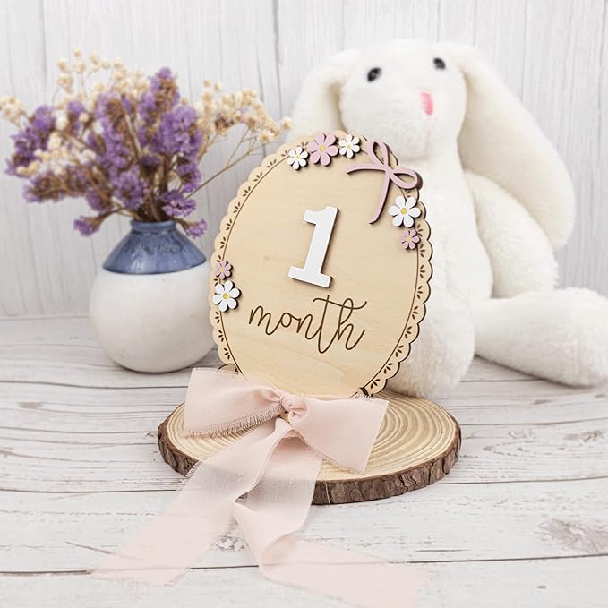 Baby Monthly Milestone Wooden Sign with Numbers and Stand – Natural Wood Milestone Board for Newborn Monthly Growth Photos – Cute 3D Flowers Photo Prop for Baby Milestone Memories (Light Pink Ribbon)