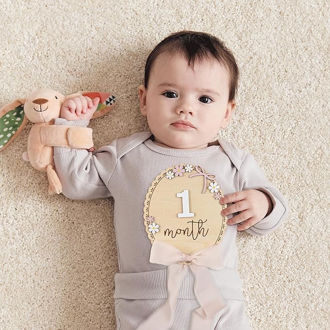 Baby Monthly Milestone Wooden Sign with Numbers and Stand – Natural Wood Milestone Board for Newborn Monthly Growth Photos – Cute 3D Flowers Photo Prop for Baby Milestone Memories (Light Pink Ribbon)