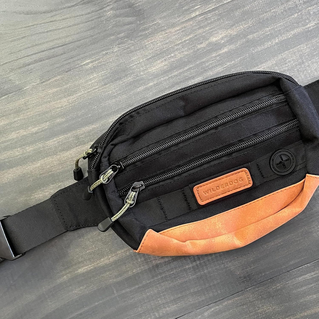 Wilderdog Utility Fanny Pack stores Treats, Balls, Keys in 3 Pockets with adjustable strap and Poop Bag dispenser (Black)